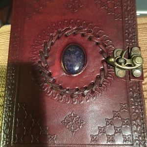 Leather-bound artisan journal/diary.